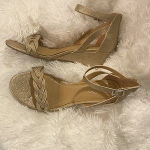 NWOT gold wedge sandals. Perfect for a dressing up or casual!